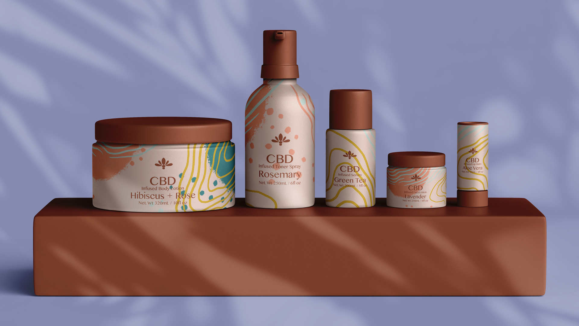 Five bottles of cosmetics products lined up and are sitting on a block.