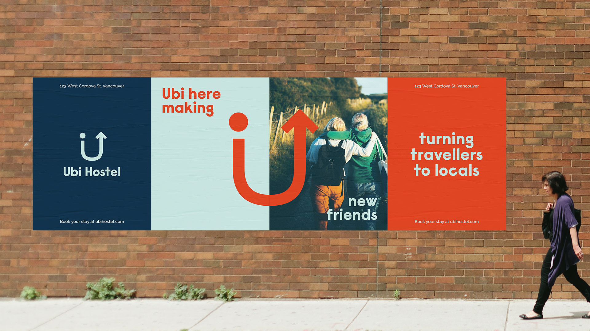 Posters advertising a hostel on a brick wall outside with a person walking by.