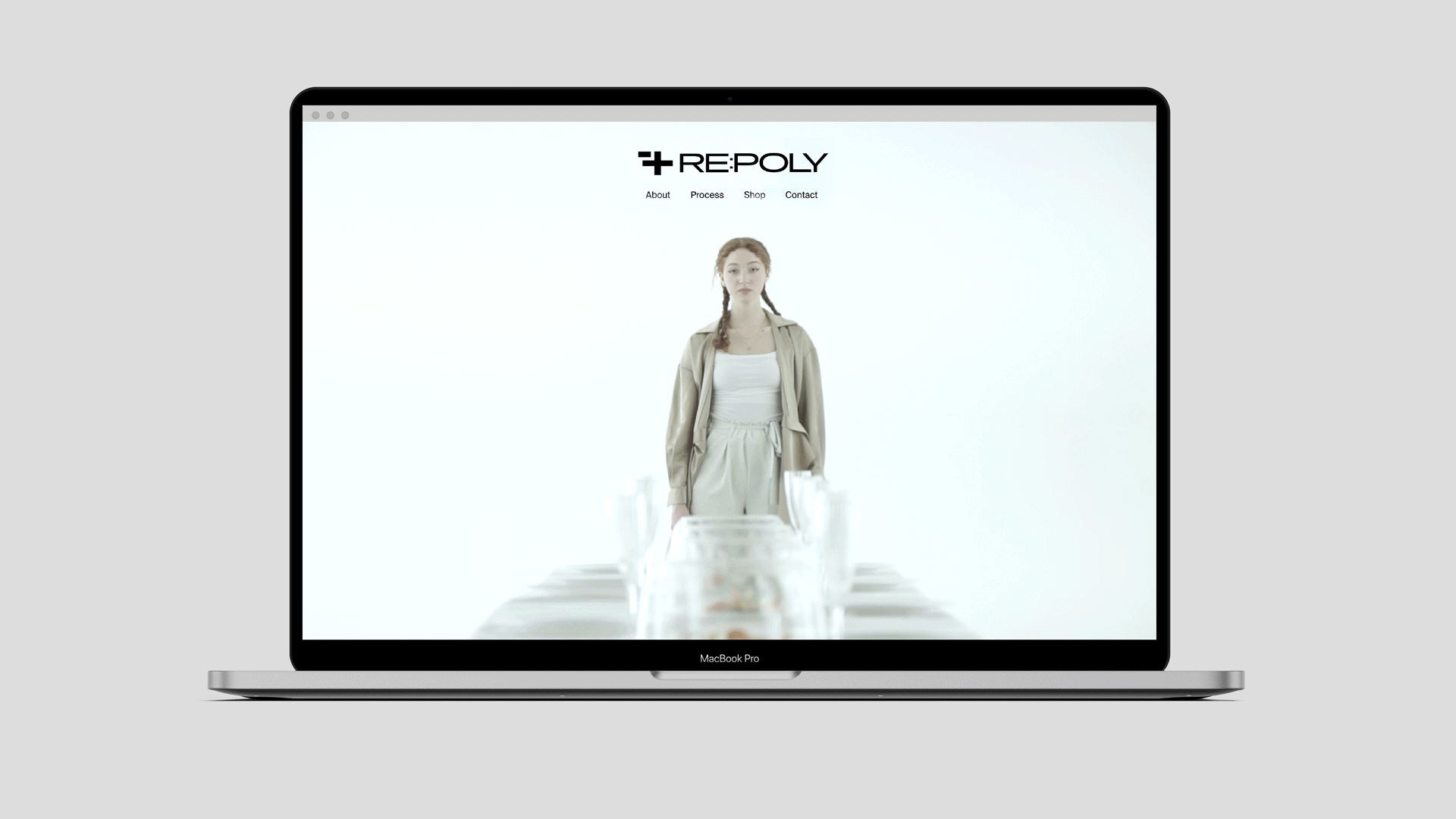 A display of both web and mobile interface design for RE:POLY.
