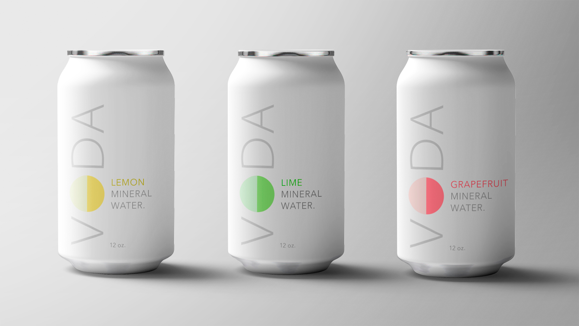 Three cans of VODA mineral water in front of a grey backdrop, the branding is simple, minimal, and clean.