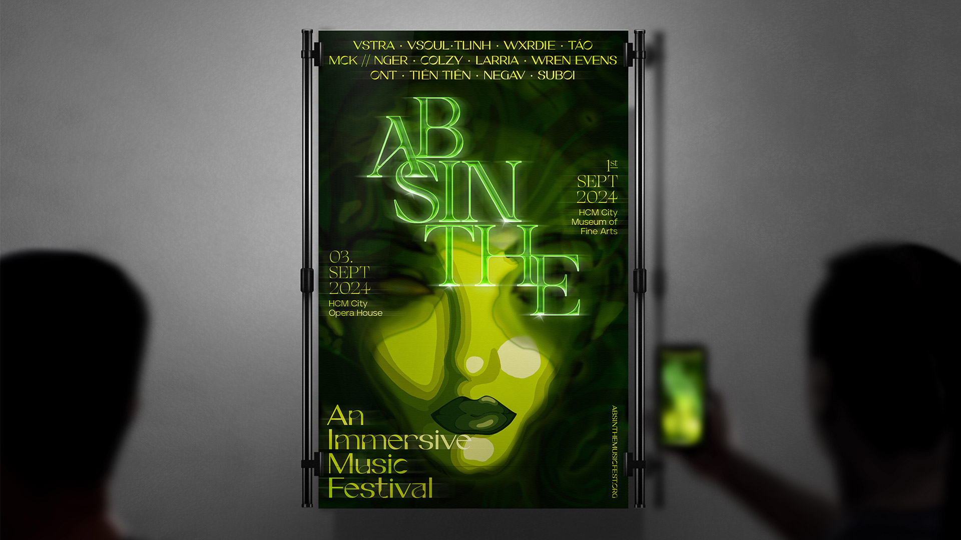 A music festival poster showing a green face displayed on wall.