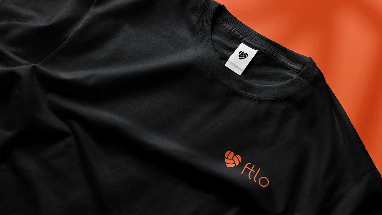 GIF of the FTLO logo superimposed onto a shirt, an image showcasing the old and new FTLO logos, a closeup of a spread of the FTLO brand guide pages, an image of two feather flags with FTLO branding next to a closeup of a shirt with the FTLO logo, an image of two bucket hats with the FTLO logo stacked on each other, and an image of a pair of shorts with FTLO branding.