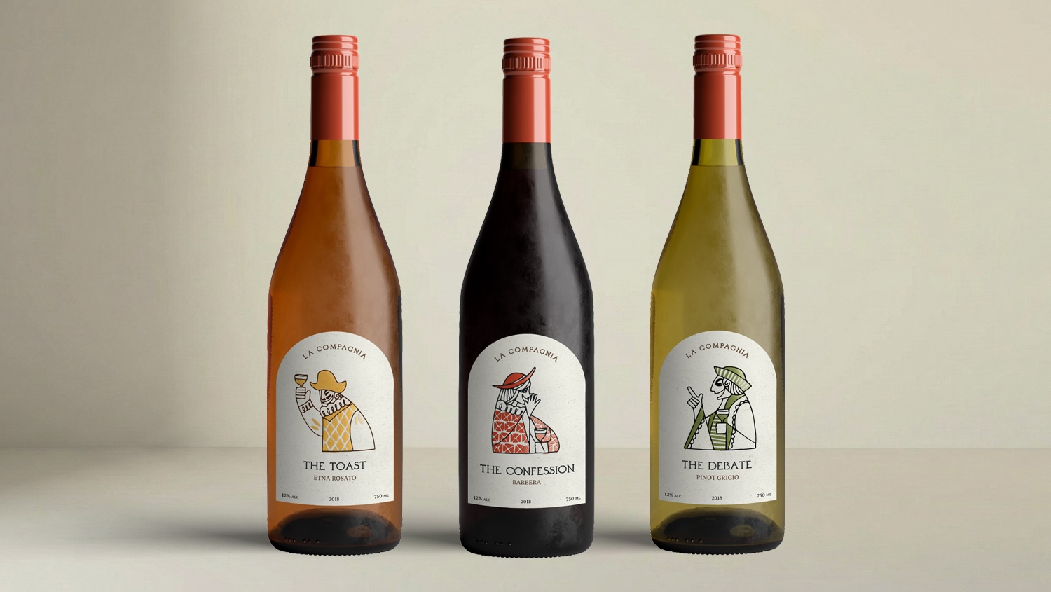 Three bottles of La Compagnia wine featuring arched labels with stylized illustrations titled "The Toast," "The Confession," and "The Debate."